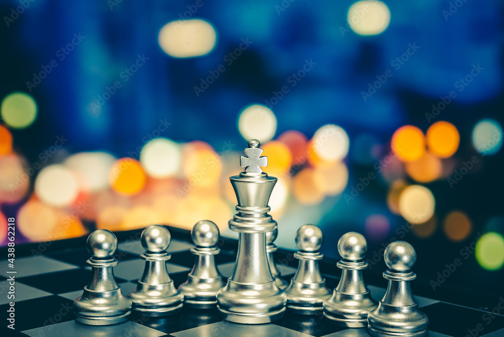 Poster closeup of chess characters on board games. to represent decision making in term of business strateg