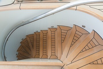 Spiral teak steps on a luxury yacht.