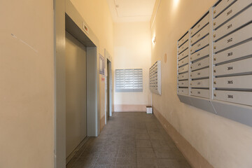 mailboxes in the lobby of an apartment building