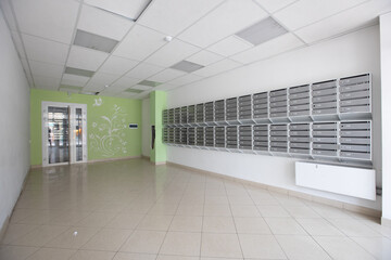mailboxes in the lobby of an apartment building