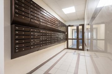 mailboxes in the lobby of an apartment building