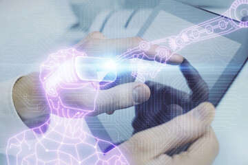 Fototapeta premium Double exposure of man's hands holding and using a digital device and AR glasses drawing. Virtual reality concept.
