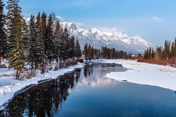 WInter Scene of creek and Mountains