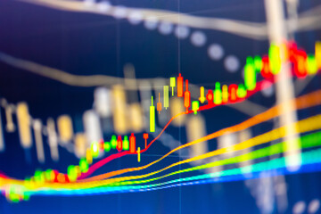 Stock market data on digital LED display. A daily market price and quotation of prices chart and candle stick tracking for Forex trading. Financial data on the digital screen as concept.