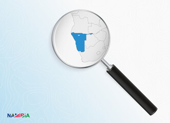 Magnifier with map of Namibia on abstract topographic background.