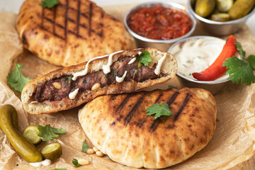 Arayes- pita bread filled with a mixture of minced meat with different spice