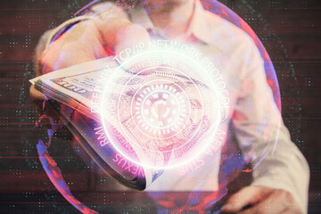 Multi exposure of Tech drawing hologram and USA dollars bills and man hands. Technology concept.