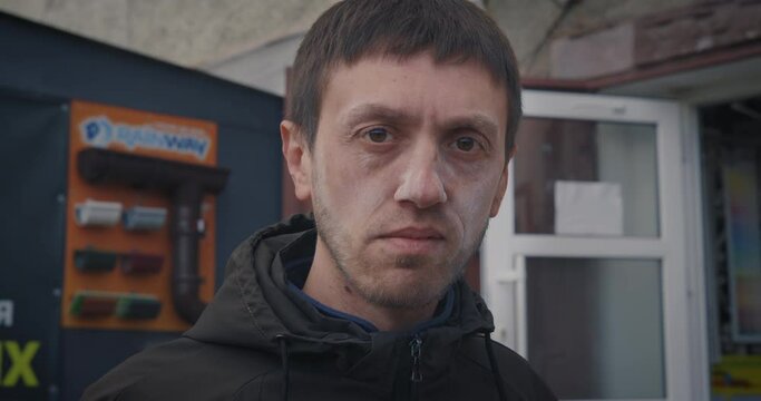 Close up portrait of a tired angry man