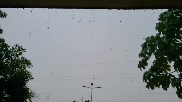raindrops falling from the roof of a park