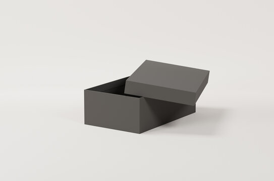 Black empty packing cardboard box on a white background. Shoe or gift box mock up.