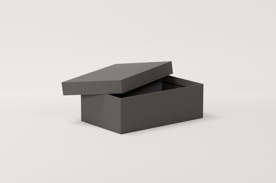 Black empty packing cardboard box on a white background. Shoe or gift box mock up.