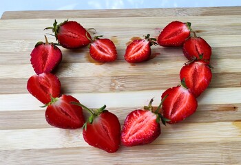 strawberries on a wooden board