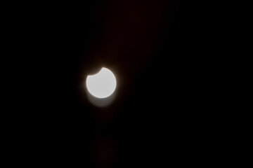 partial solar eclipse, part o the sun covered by the moon