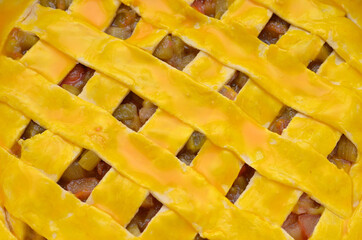 beautifully laid out dough with egg yolk close-up, cooking phase