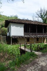 Typical street and old houses at historical village of Bozhentsi, Bulgaria