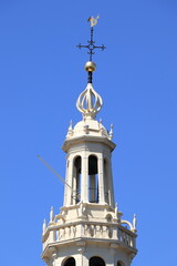 Fototapeta na wymiar Amsterdam Montelbaanstoren Tower White Wooden Spire Detail Against a Blue Sky