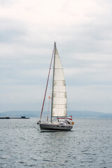Obraz premium North American sailboat off the Galician Atlantic coast