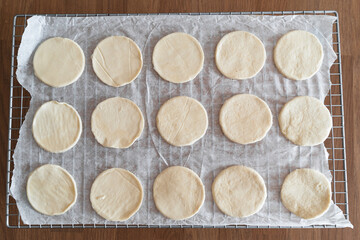 Rolled out circles of puff pastry dough