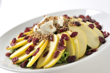 Apple salad with cranberry and goat cheese