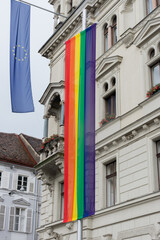 Naklejka premium Rainbow flag at the Rathaus (town hall) for the annual gay parade in Graz, Austria