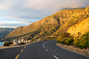 Scenic Chapmans peak drive on a sunset time - 438893445