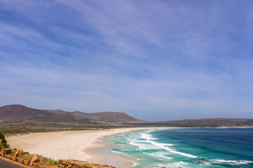 Naklejka na ściany i meble Beautiful white sand Noordhoek beach along Chapman's peak drive Cape Town