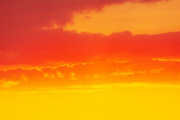 Obraz premium Red clouds at yellow sky . Colorful sunset 