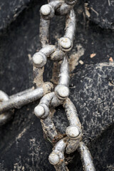 Chains on the tires of a logging tractor.