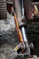 Hydraulic piston on a mining tractor.