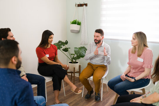 Diverse People Paying Attention During Group Counseling