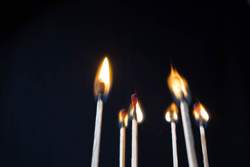 温暖化　マッチの炎と煙