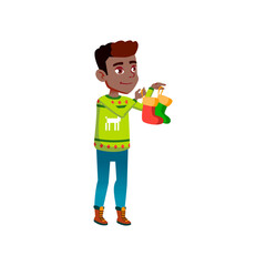 smiling boy teenager holding socks for santa claus presents cartoon vector. smiling boy teenager holding socks for santa claus presents character. isolated flat cartoon illustration