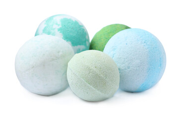 Many colorful bath bombs on white background