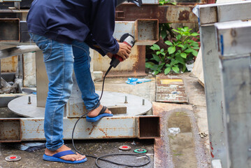 without safety gloves at work. Construction workers do not wear gloves and safety shoes to work....