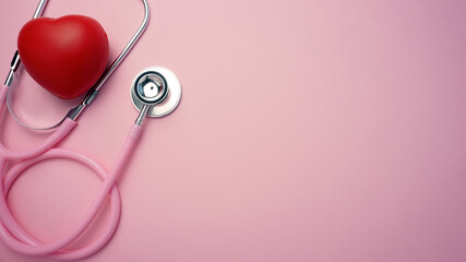 Heart and stethoscope on pink background. Concept for health care.

