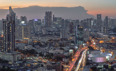 Bangkok, Thailand - Jun 01, 2021: Aerial view of Beautiful scenery view of Skyscraper Evening time Sunset creates relaxing feeling for the rest of the day. Selective focus.