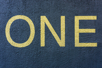 Large Word ONE written on Wall in Paint
