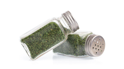 bottle dried parsley isolated on white background.