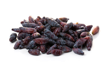 Berries are blue honeysuckle isolated on a white background.
