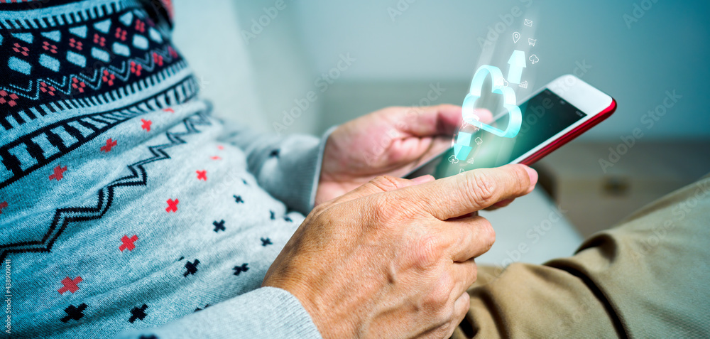 Aufkleber man using mobile phone and smart home application as automation assistant. panoramic banner of futur