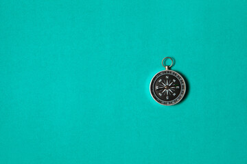 Compass on green background. Concept signs symbols.