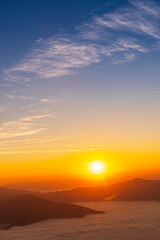 Sunrise / Sunset Landscape of the mountain and sea of mist in winter sunrise view from top of Doi Pha Tang mountain , Chiang Rai, Thailand