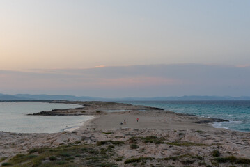 Wonderful sunset on the deserted beach of Ses Illetes on the Island of Formentera in Spain.