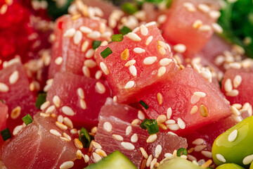 Closeup on hawaiian tuna poke bowl with vegetables