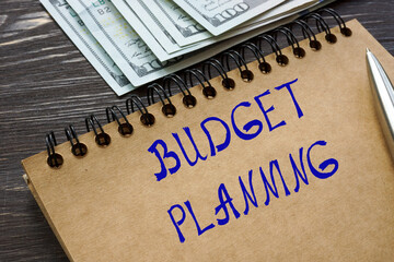 Conceptual photo about BUDGET PLANNING with handwritten text.