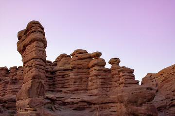 Hoodoo desert rock formations in San Lorenzo Canyon landscape at sunset. The canyon is outside of Socorro, New Mexico, USA