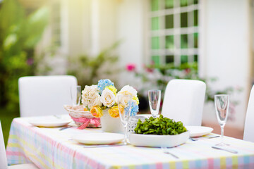 Summer lunch outdoors. Table setting for barbecue.