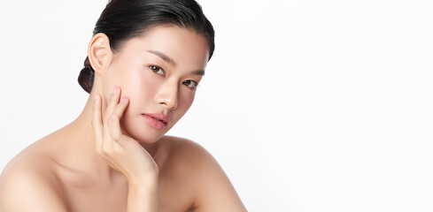 Naklejka premium Beautiful young asian woman with clean fresh skin on white background, Face care, Facial treatment, Cosmetology, beauty and spa, Asian women portrait.