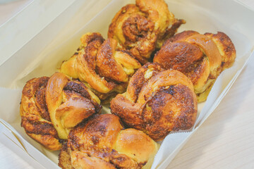 A box of cinnamon buns