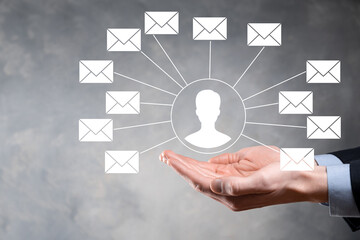 Male hand holding letter icon,email icons .Contact us by newsletter email and protect your personal...